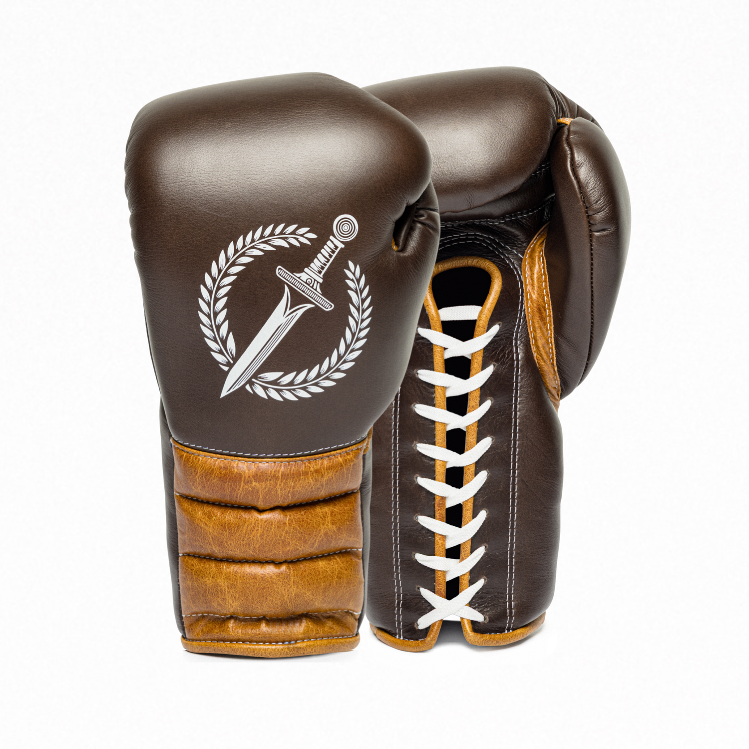 A pair of Gladius Cowboy brown boxing gloves on a white background.
