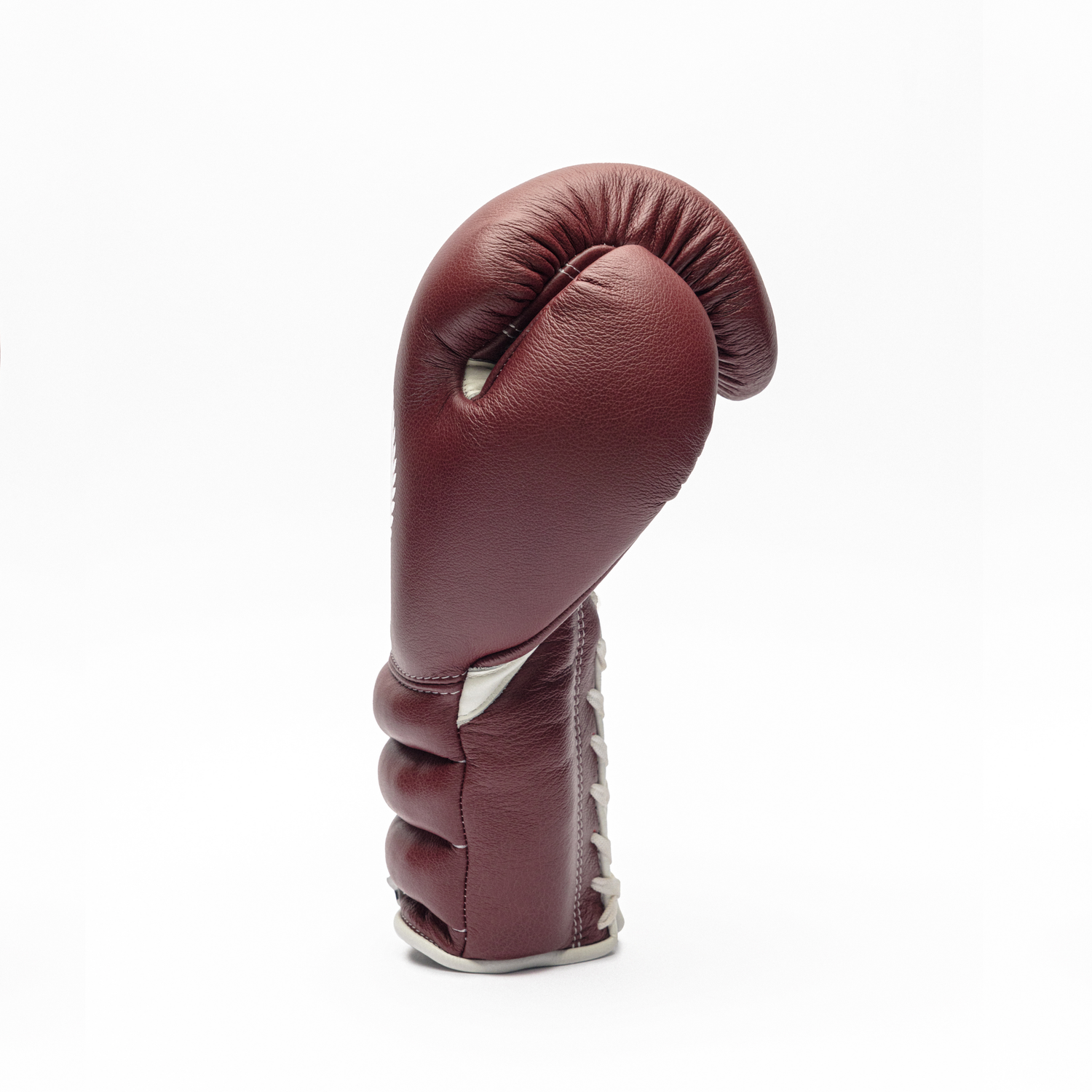 Maroon boxing glove on a white background.