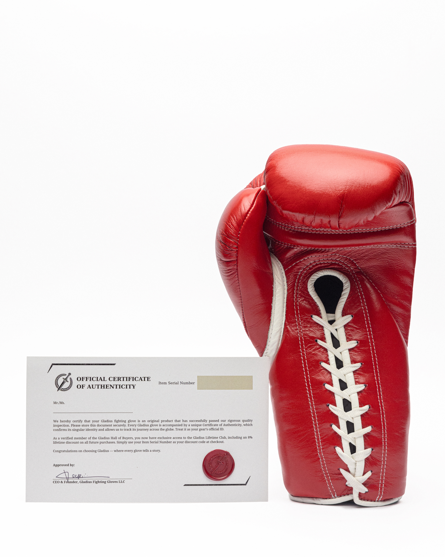 Red boxing glove with a Certificate of Authenticity on a white background