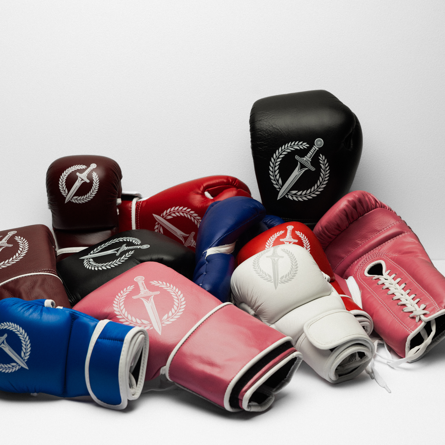 Colorful boxing gloves with a logo on a white background
