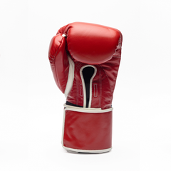 Red boxing glove on a white background.