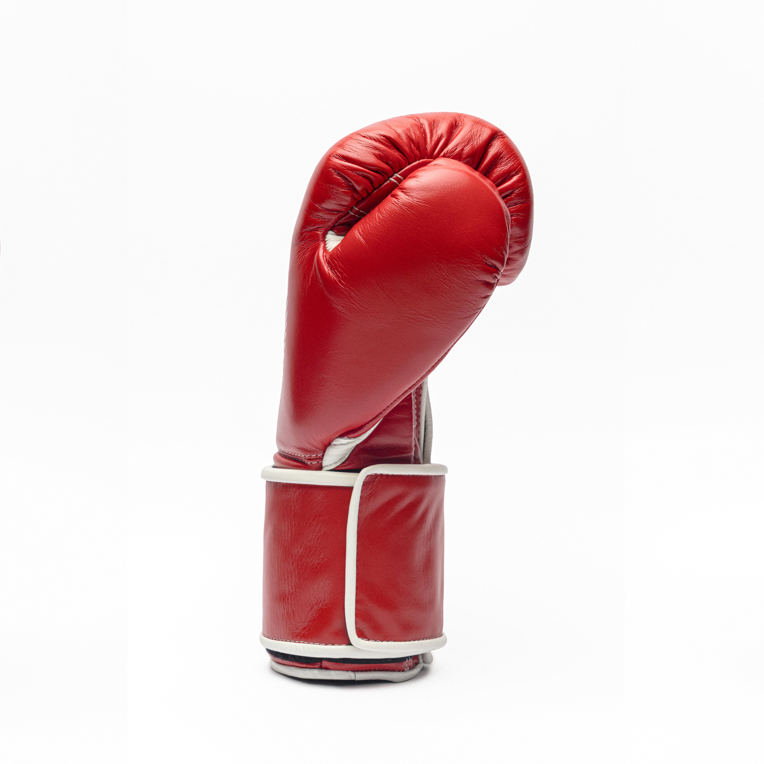 Red boxing glove on a white background.