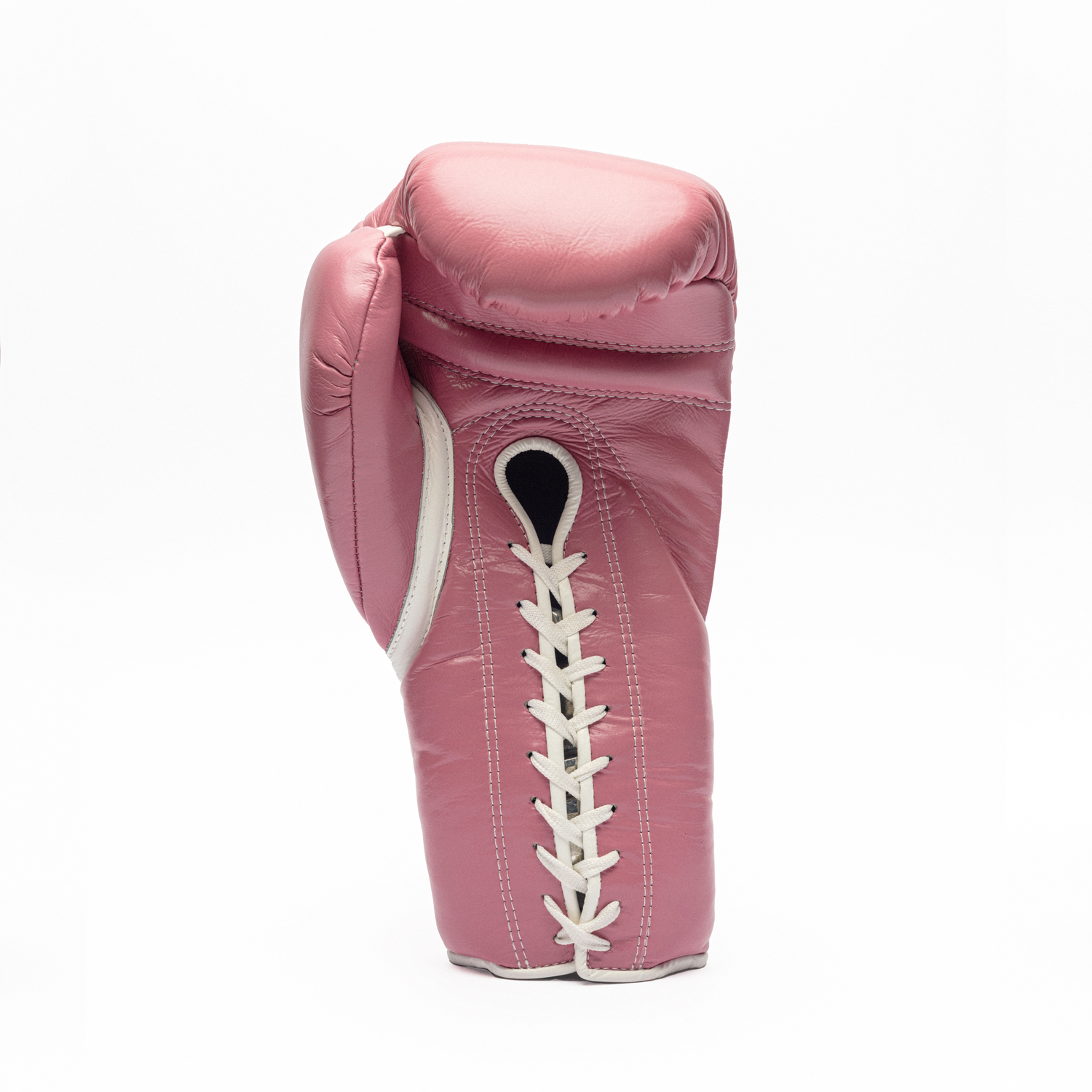 Pink boxing glove with white laces on a white background.