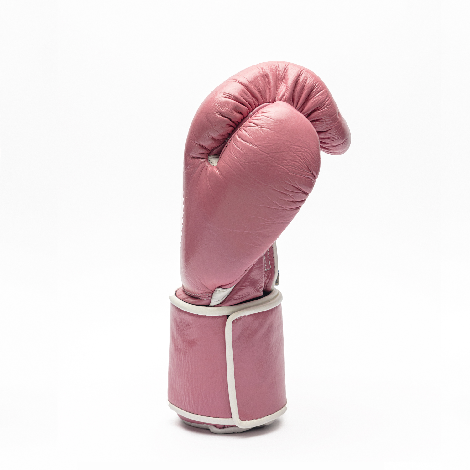Pink boxing glove on a white background.