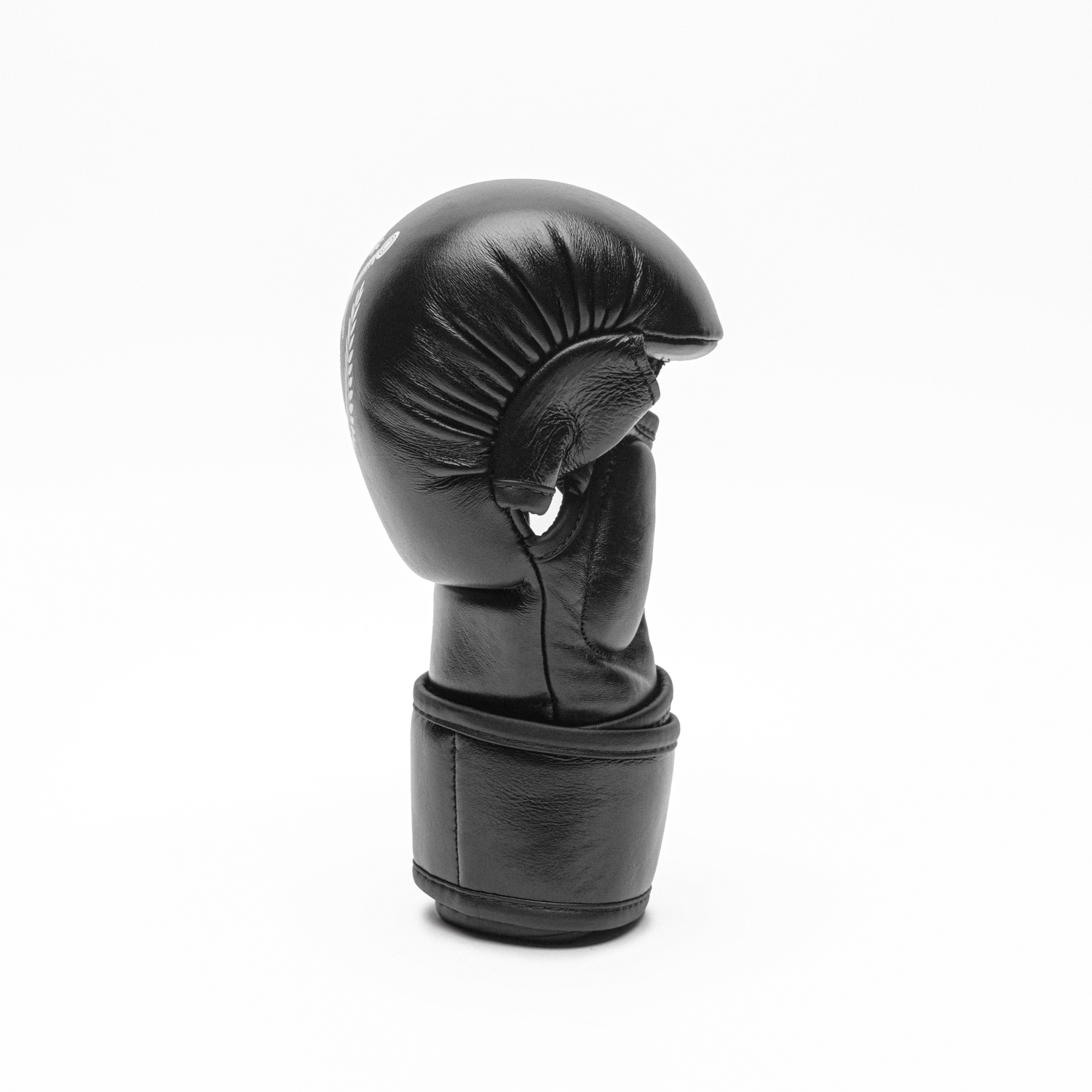 Black MMA glove on a white background