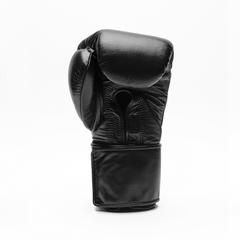 Black boxing glove on a white background.