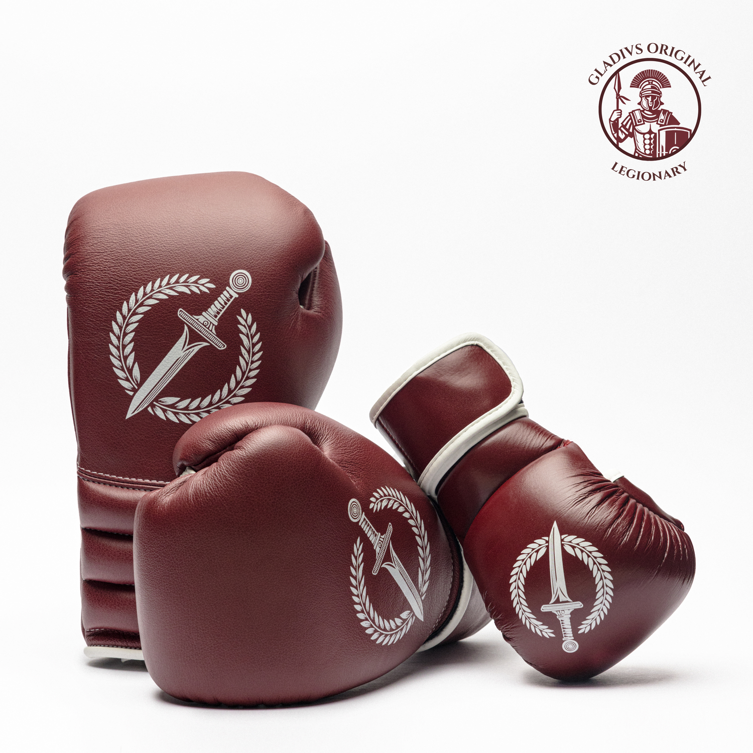 Maroon boxing gloves with a logo on a white background, featuring the brand 'Gladius Legionary'.