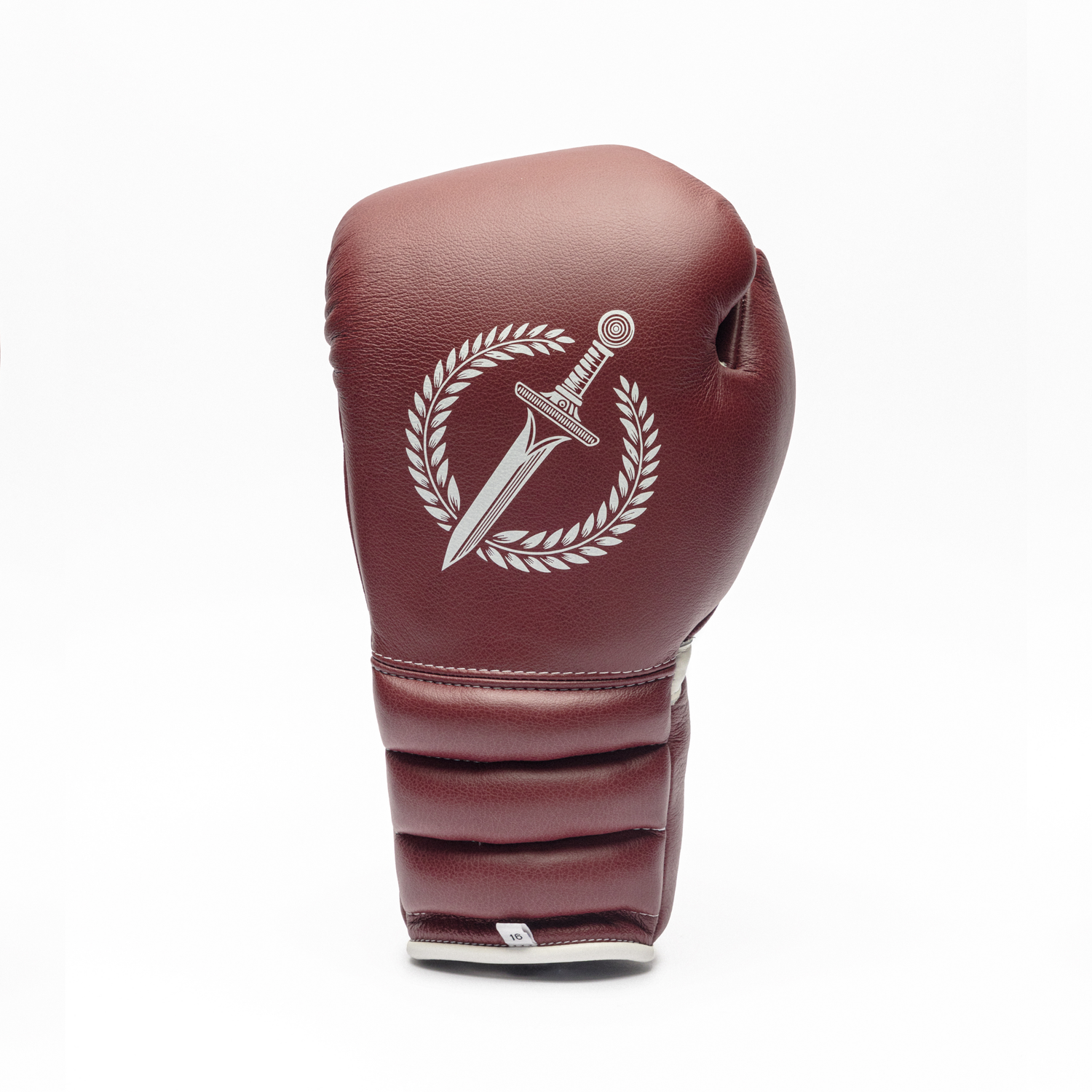 Maroon boxing glove with a white emblem on a white background.