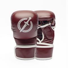 Pair of maroon MMA gloves with a white logo on a white background.