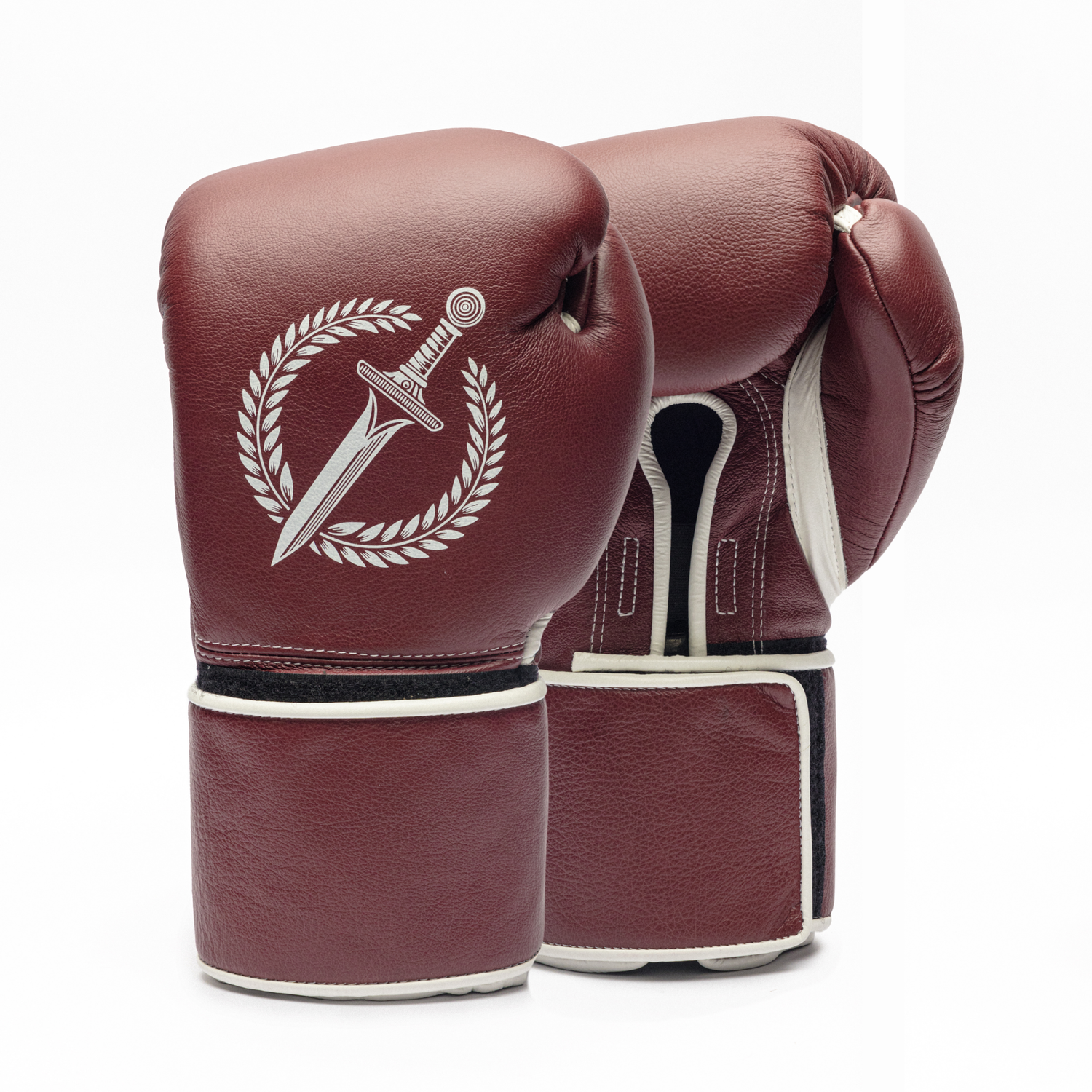 Pair of maroon boxing gloves with a logo on a white background.